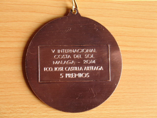 Reverso de medalla.